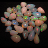 The Most Beautifull Highest Quality ETHIOPIAN Opal - Tear drops Shape Cabochon - Every Pcs Have Full Amazing Flashy Fire size - 6x8- 8x12 mm - 33 pcs weight 41.00 cts lot -